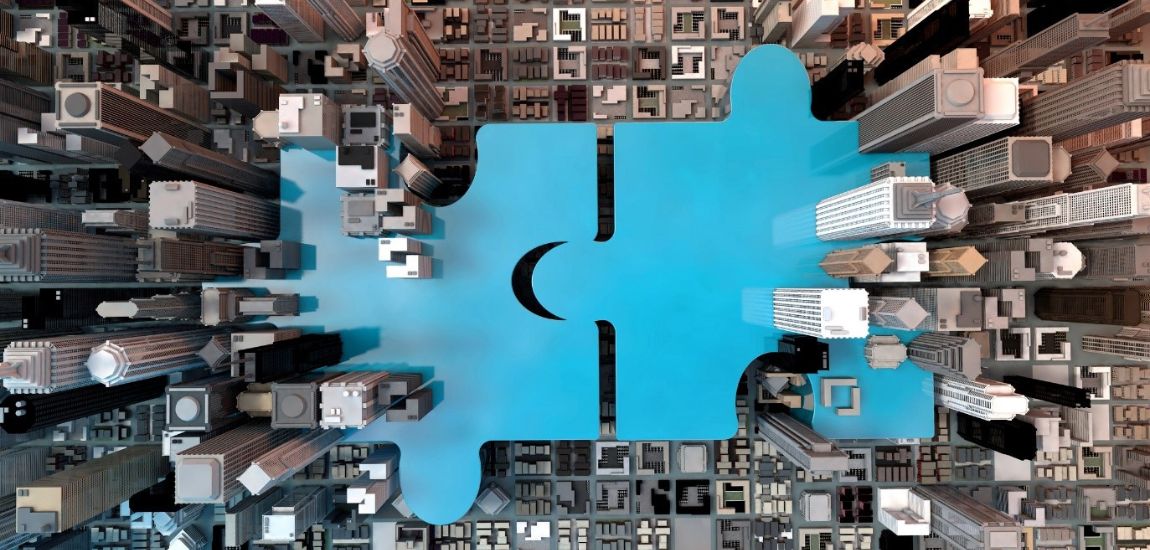 two blue puzzle pieces in a city